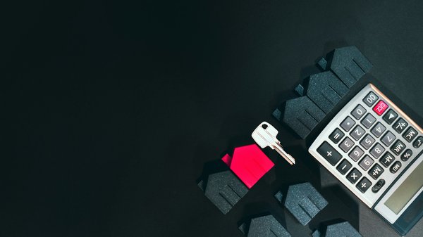 How can UK property investors diversify their portfolios to mitigate risk?